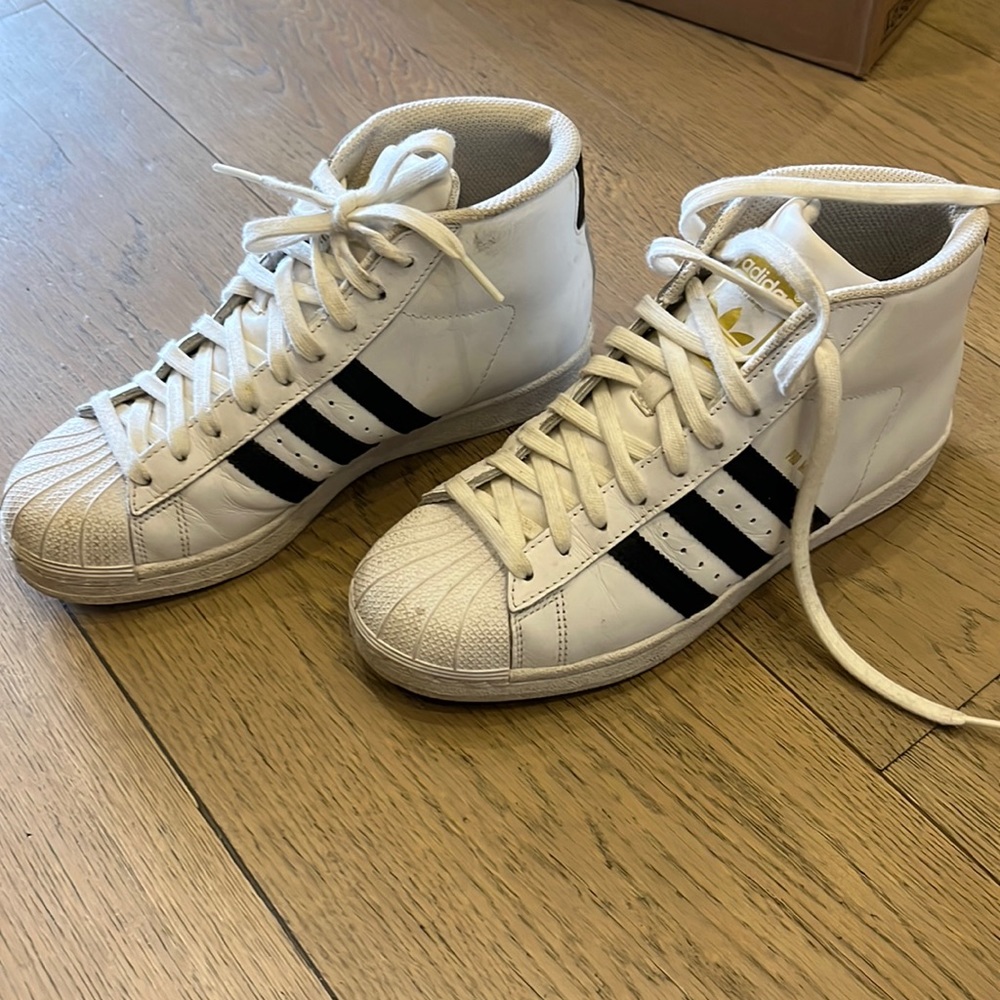 Adidas High tops (size 5 in men’s) but I wore them as a size 7 women’s